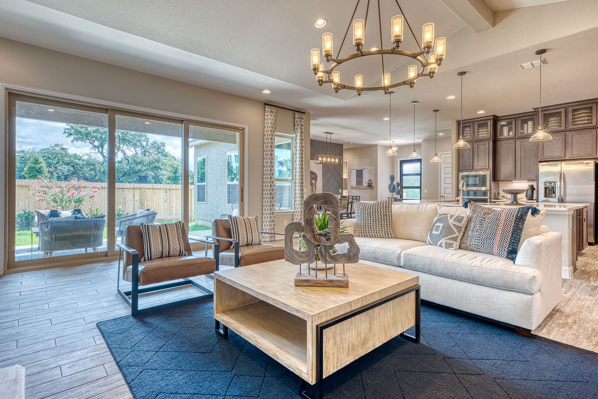 Pond Hill - 5 living Modern living room with large windows and decor.